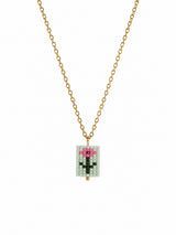 A gold chain necklace featuring a rectangular beaded pendant with a pixelated flower design in pink, green on a mint background.